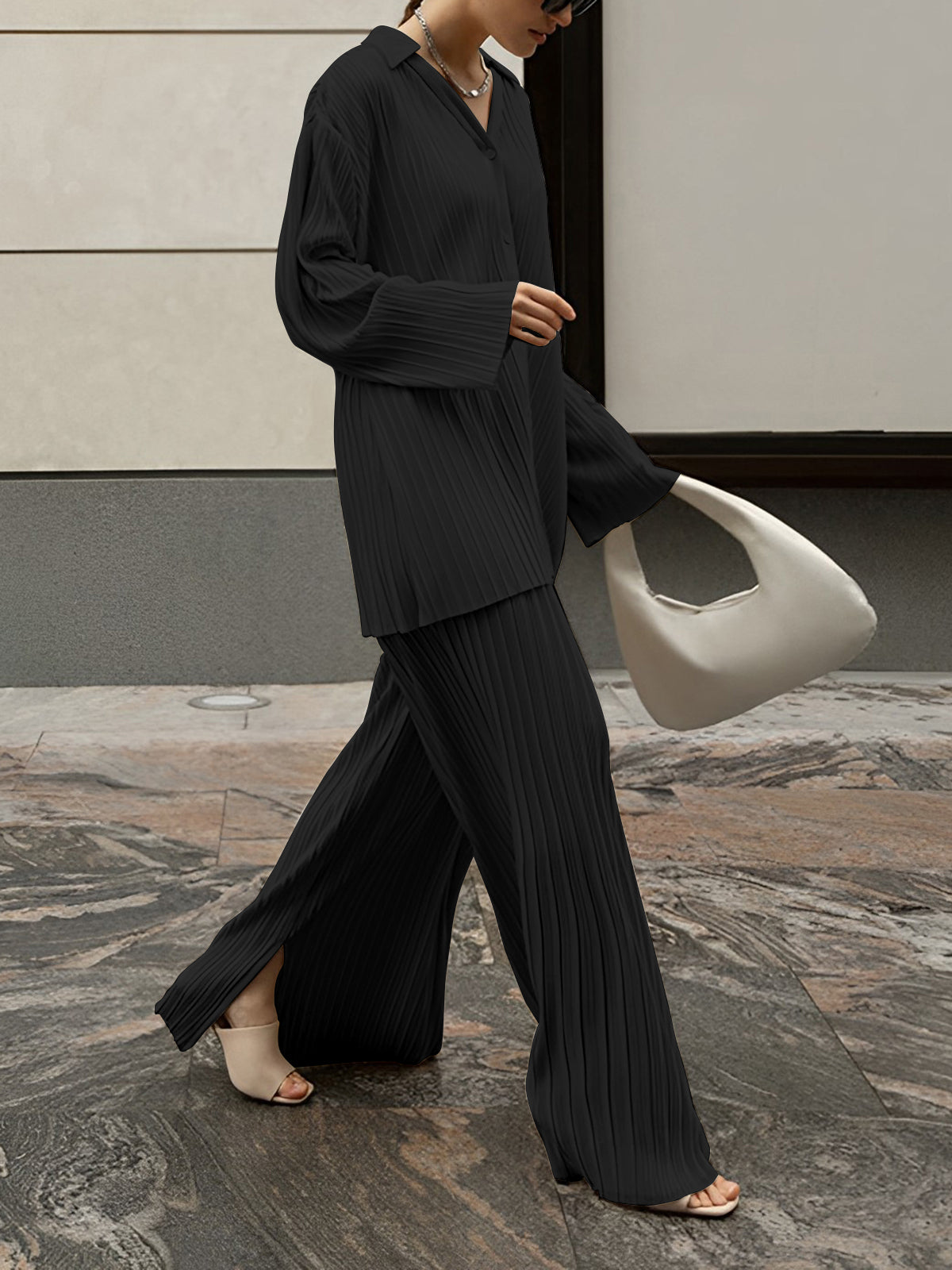 Oversized pleated two-piece pants set in neutral woven fabric with pleat-front wide-leg trousers