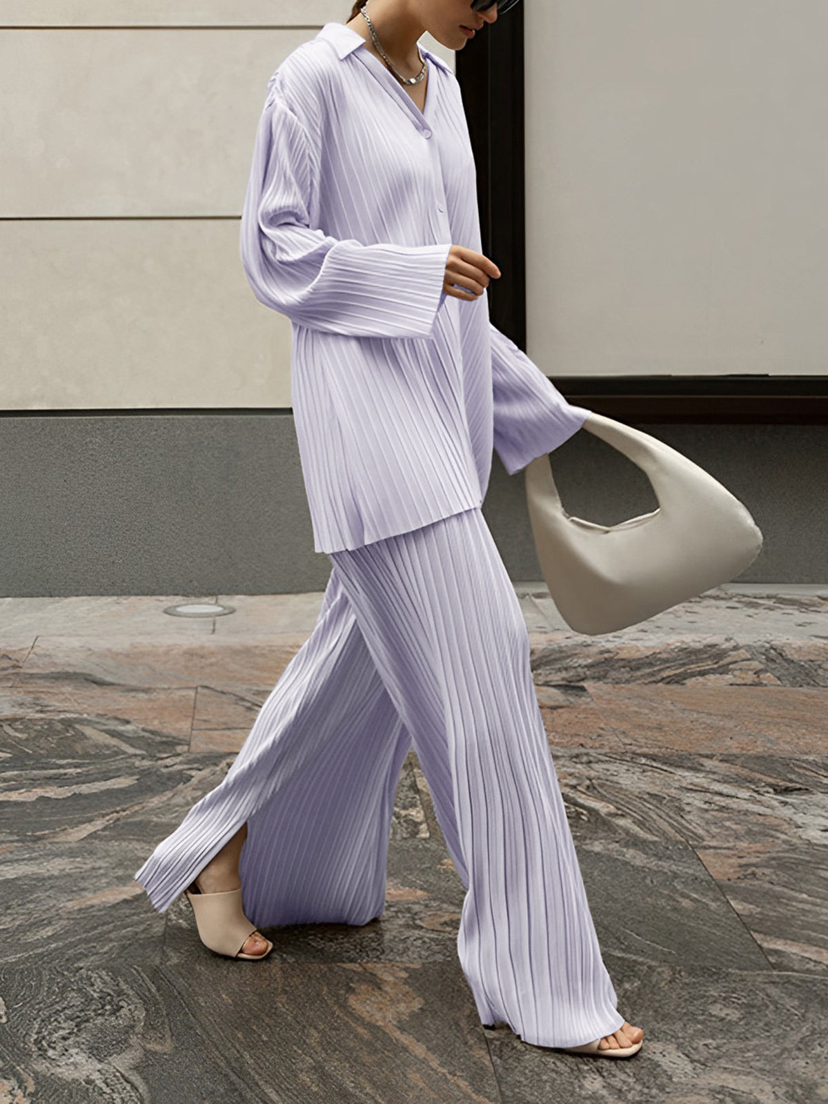 Oversized casual two-piece pants set with pleated design and pleat pockets in woven fabric