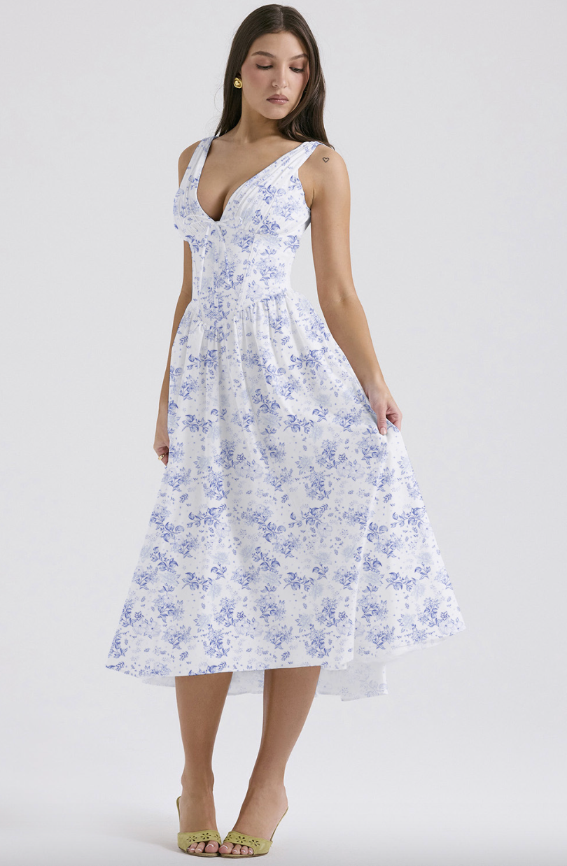 Saffron yellow women's wedding guest midi dress flowy feminine silhouette waist-defining summer 2026