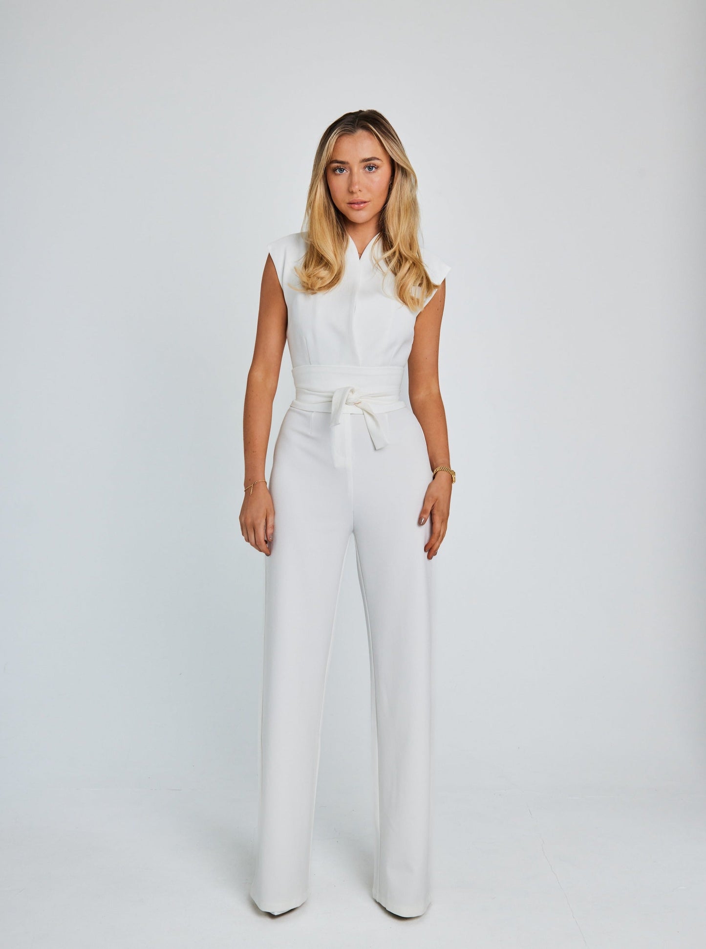 Women's sleeveless wide-leg belted jumpsuit with tone-on-tone removable belt, structured stretch fit