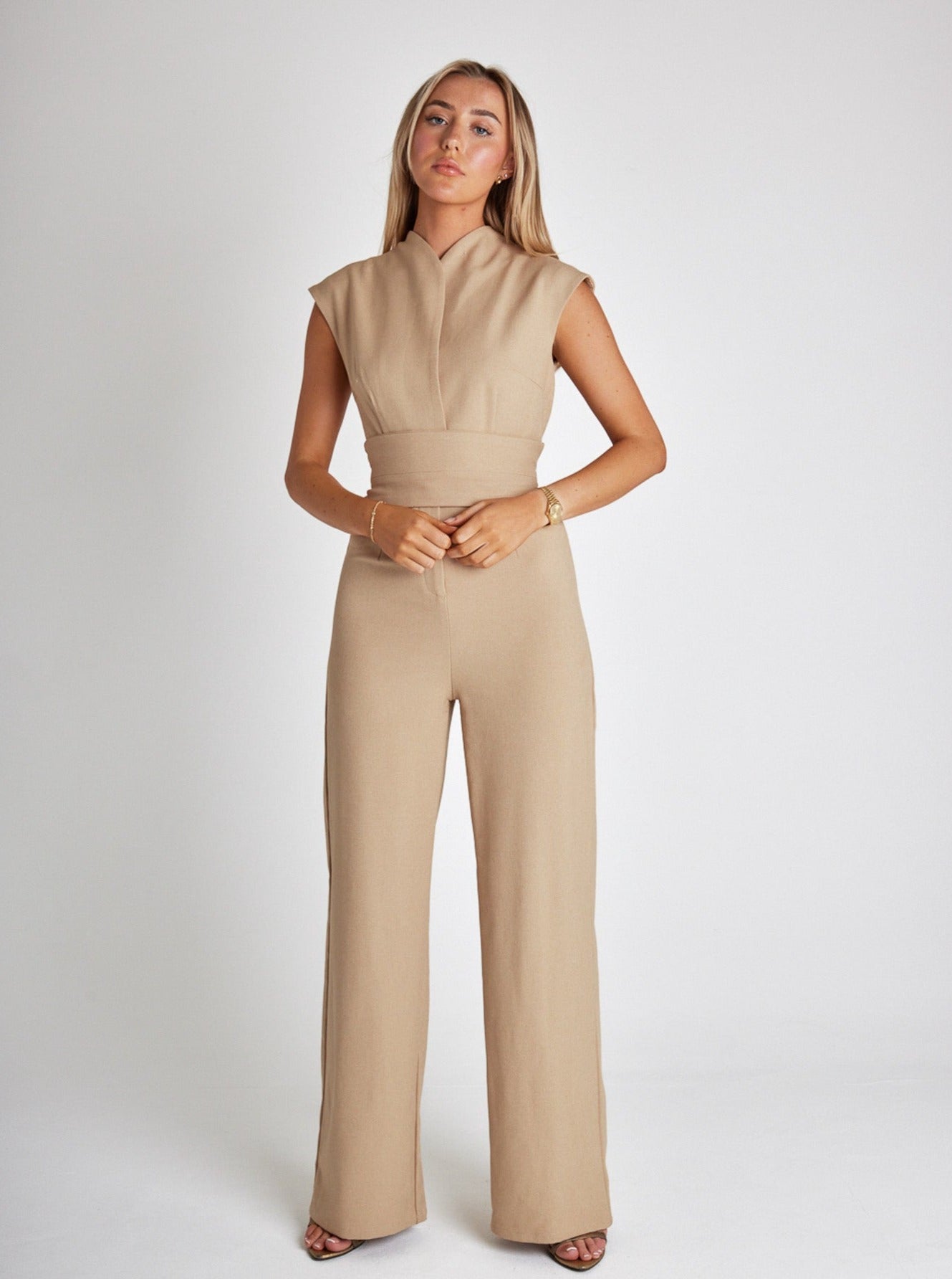 Women's sleeveless wide-leg jumpsuit with removable tone-on-tone belt, structured stretch fabric