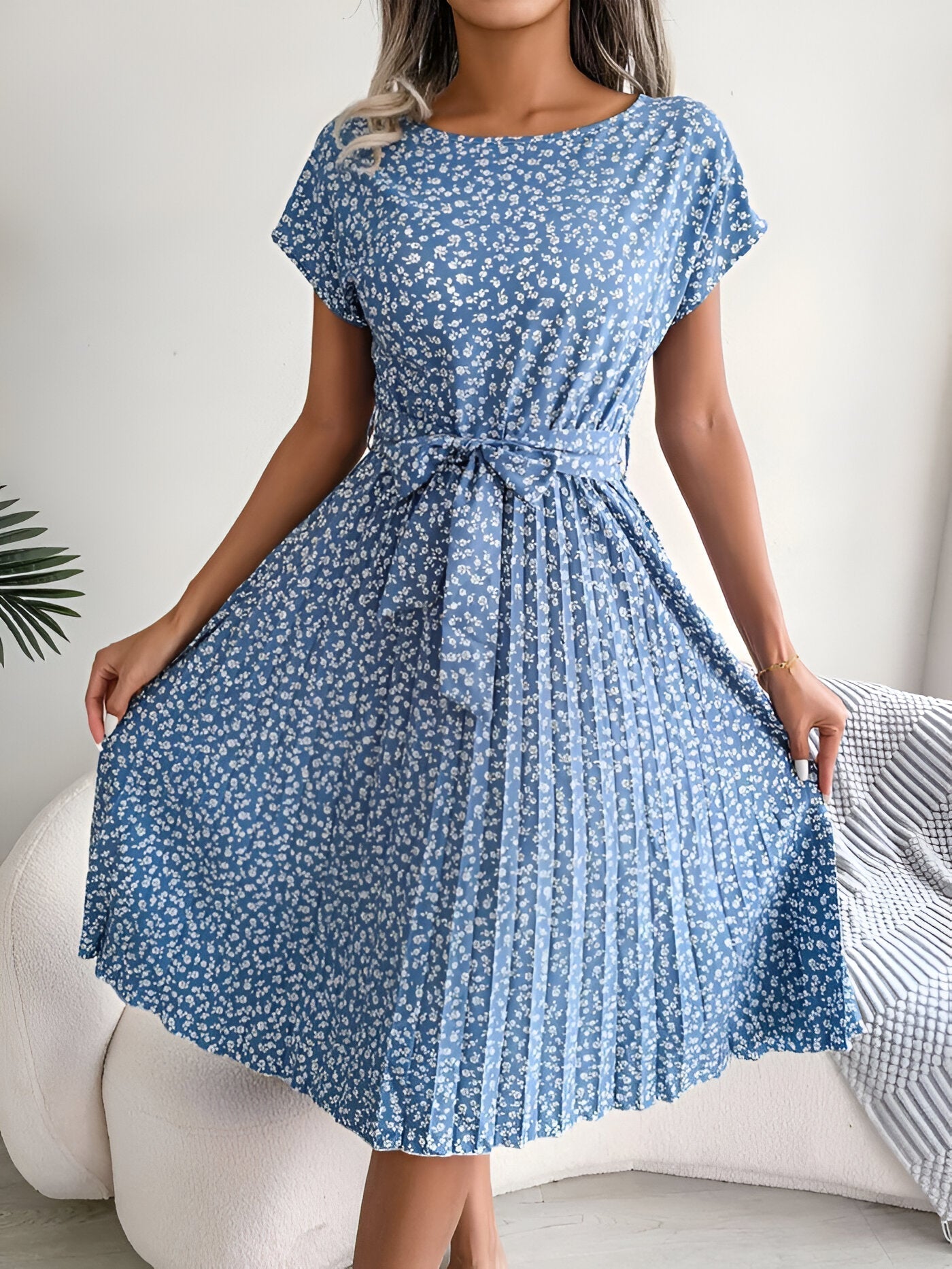 Floral pleated A-line dress with vibrant print and elegant flowing skirt for women