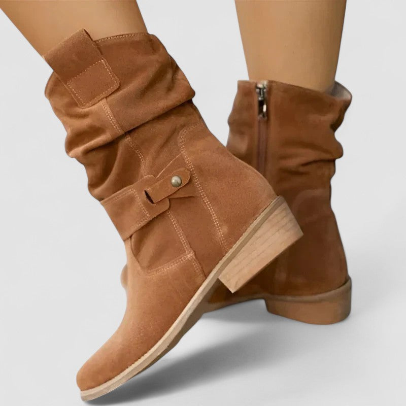 Black ankle-height comfort boots with streamlined silhouette and built-in comfort support