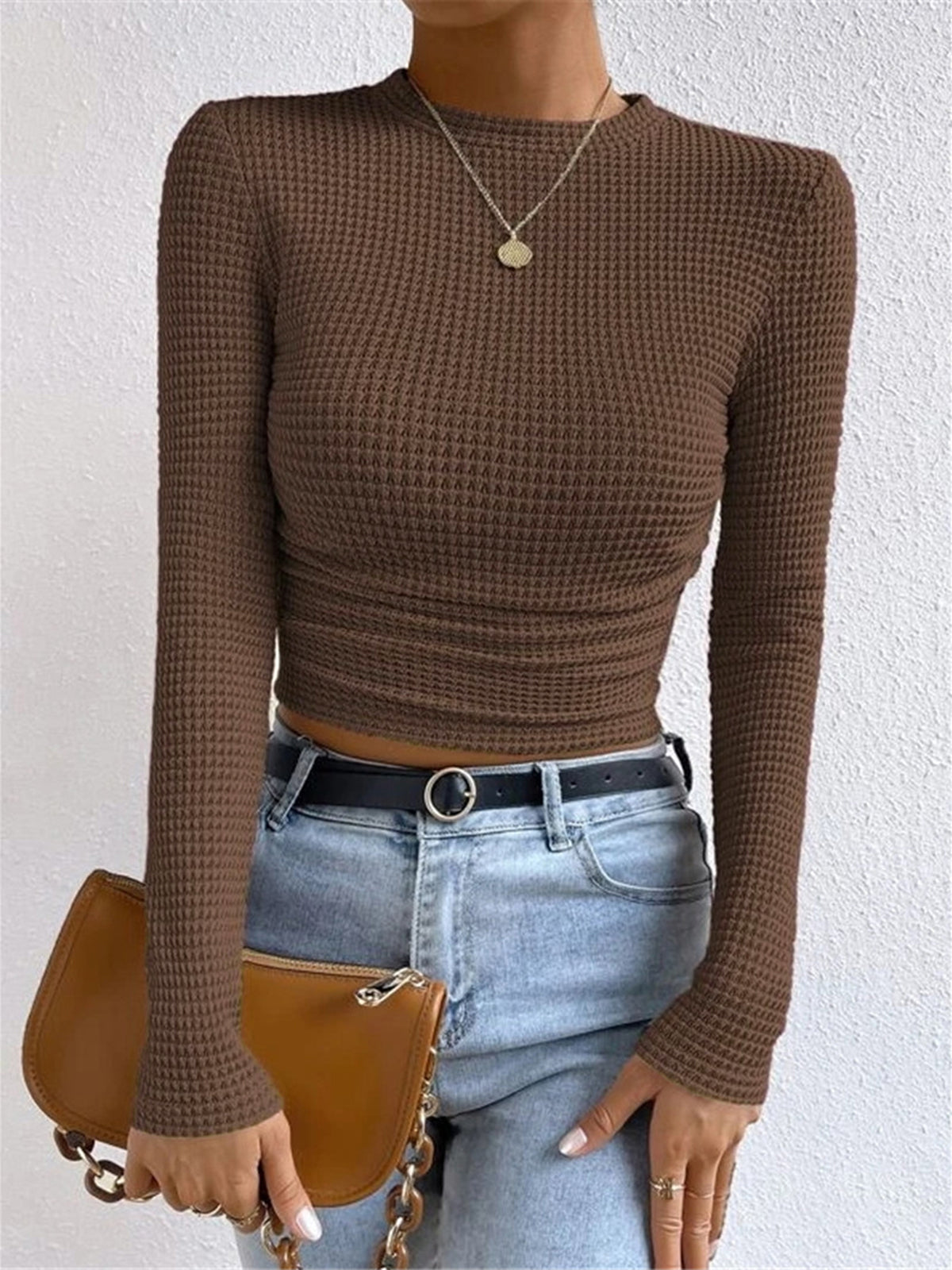 Plain waffle knit slim fit crew neck sweater in casual long sleeve style with textured pattern