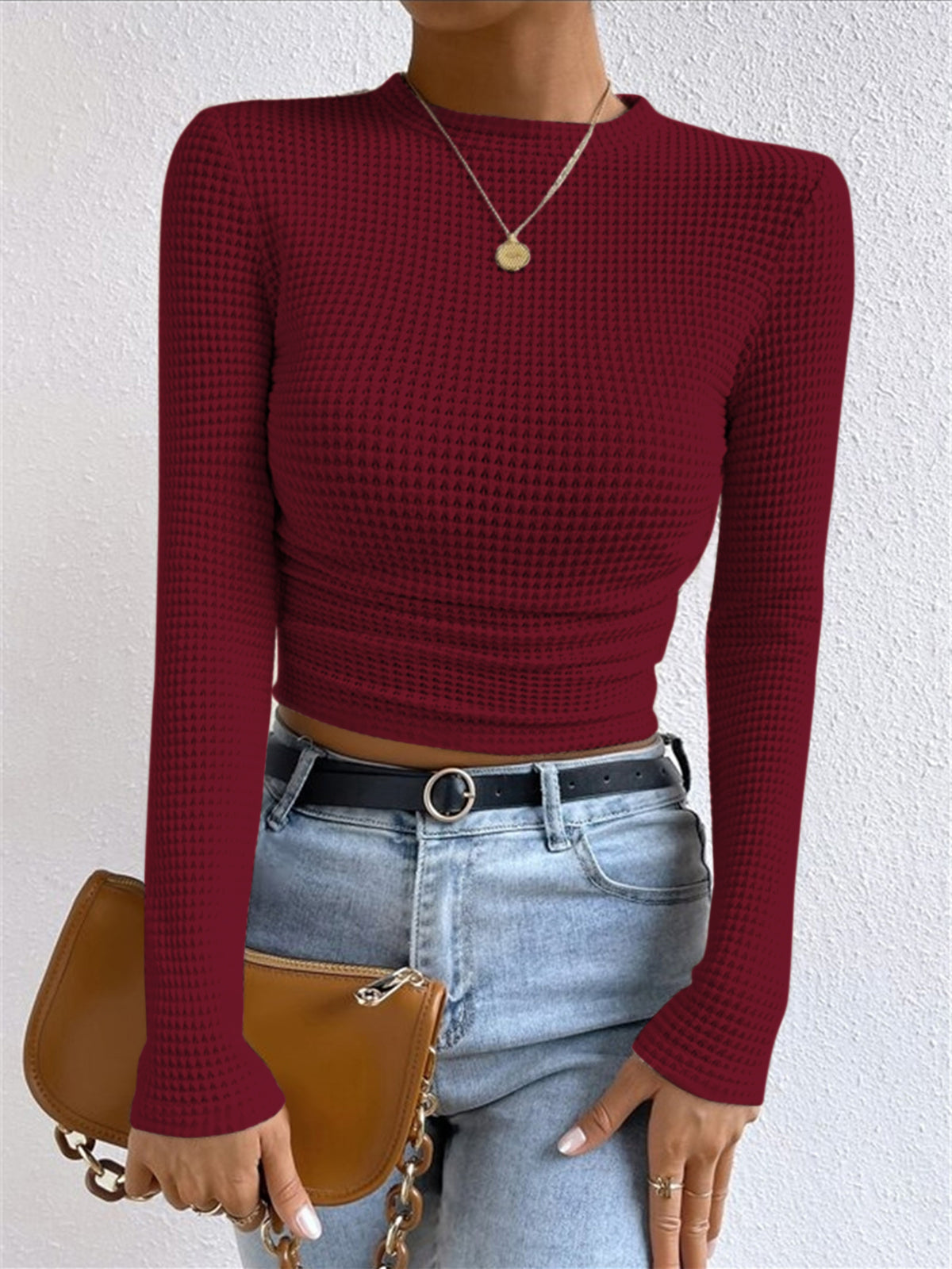 Plain waffle knit slim fit crew neck sweater in casual long sleeve style with textured fabric