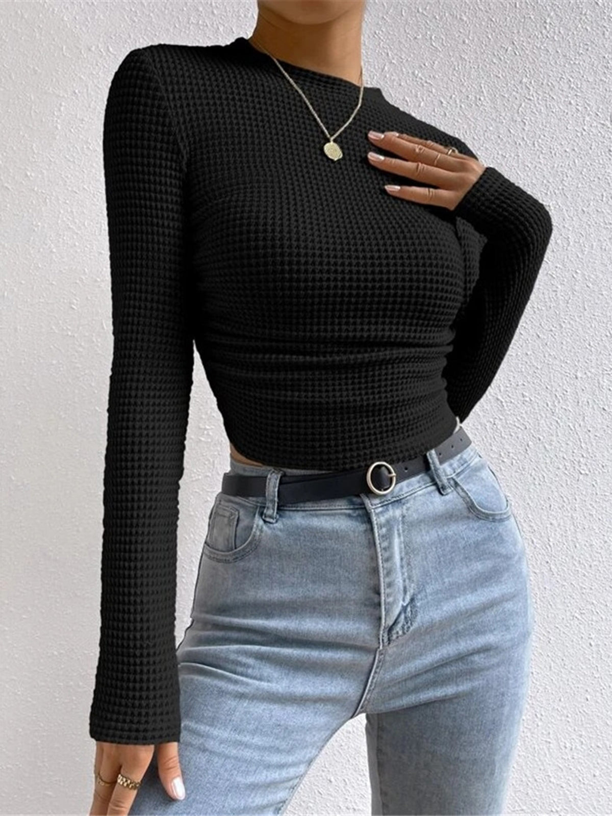 Plain waffle knit slim fit crew neck sweater with long sleeves and textured pattern