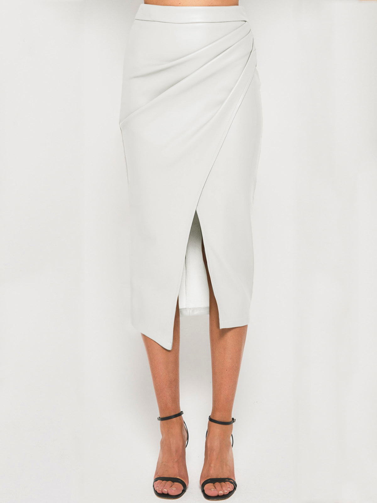 Black midi PU leather pleated skirt with split hem, sleek vegan-friendly silhouette for work and evenings