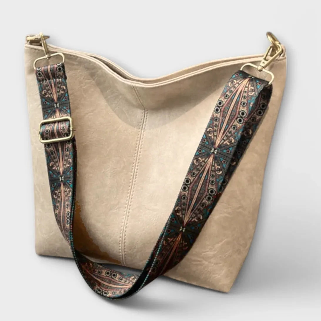 Ingebjorg shoulder bag with wide patterned strap, classic silhouette meets modern artistic detail