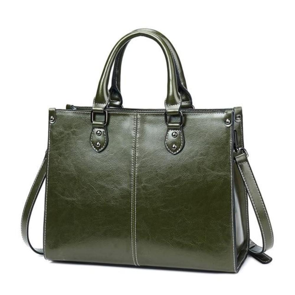 Structured faux leather handbag with top handles and removable shoulder strap in classic silhouette