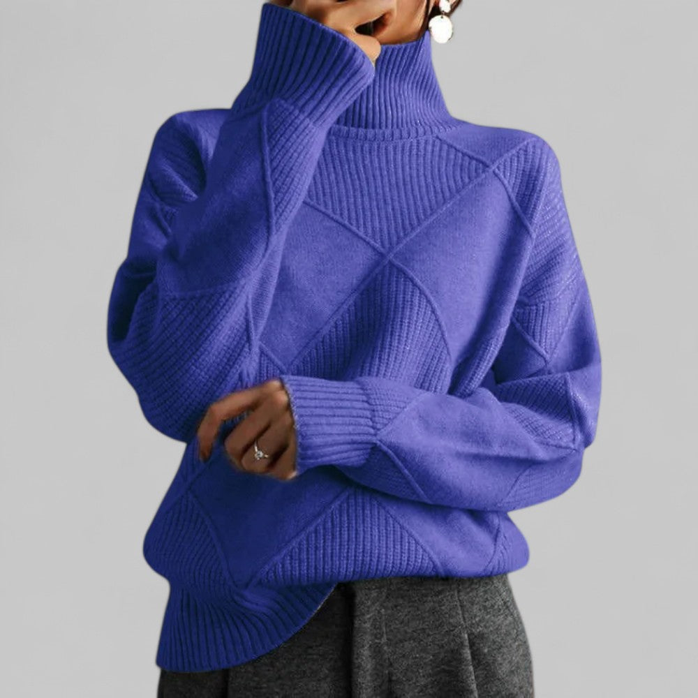 Women's oversized turtleneck sweater relaxed silhouette bold patterned texture winter layering piece