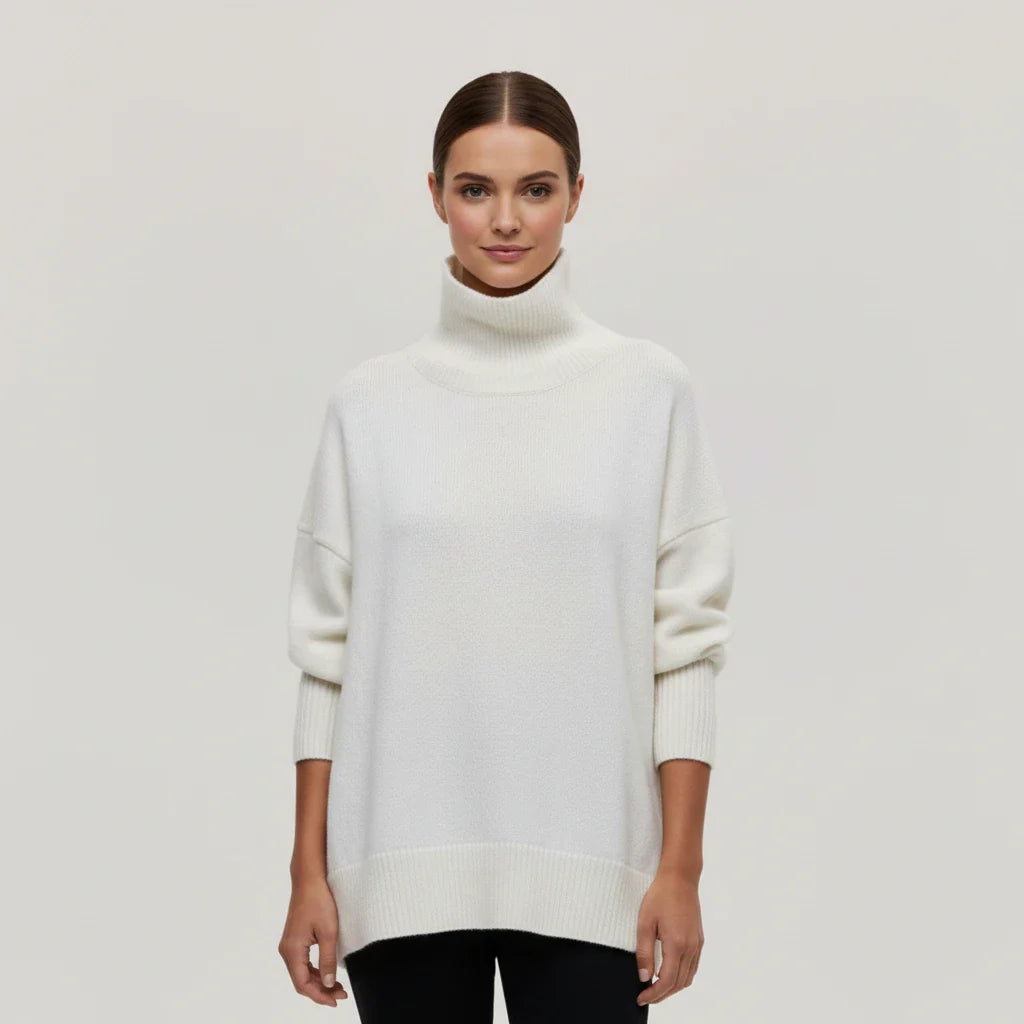 Women's oversized turtleneck knit sweater with drop shoulders and ribbed texture for cozy layering