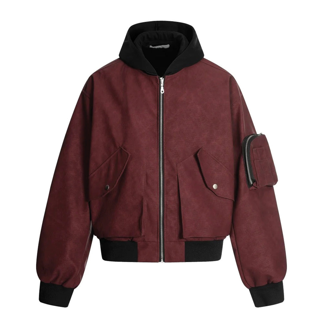 Raw structured cotton jacket with contrast hood, oversized snap flap pockets, and zip sleeve utility pocket