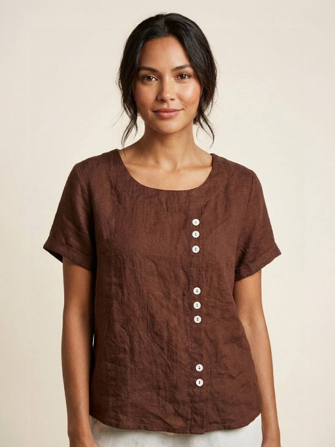 Women's casual scoop neck top with cuffed short sleeves and vertical off-center button detail