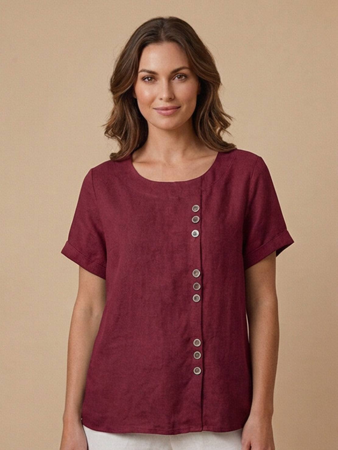 Women's casual scoop neck top with cuffed short sleeves and vertical off-center button detail