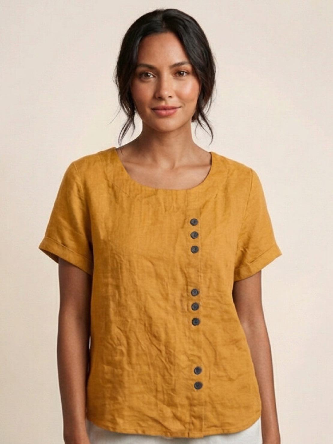 Women's casual scoop neck top with cuffed short sleeves and vertical off-center button accent detail