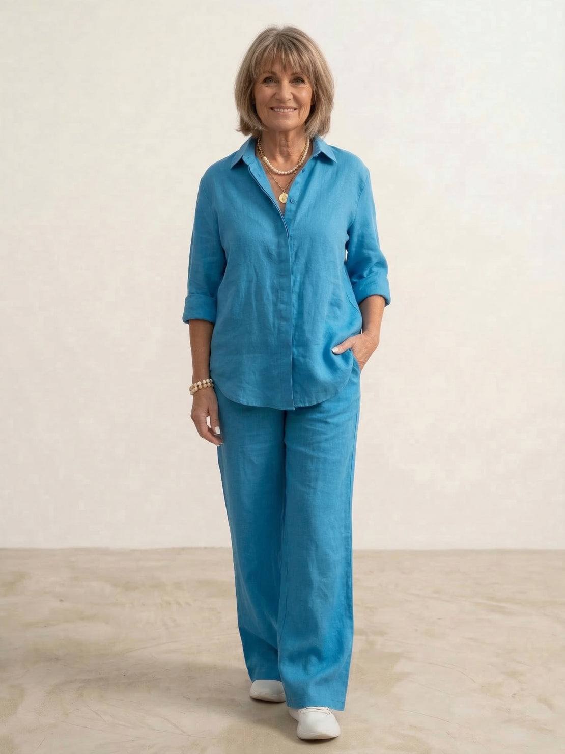 Women's casual beige button-down shirt and wide-leg pants matching two-piece set with relaxed silhouette