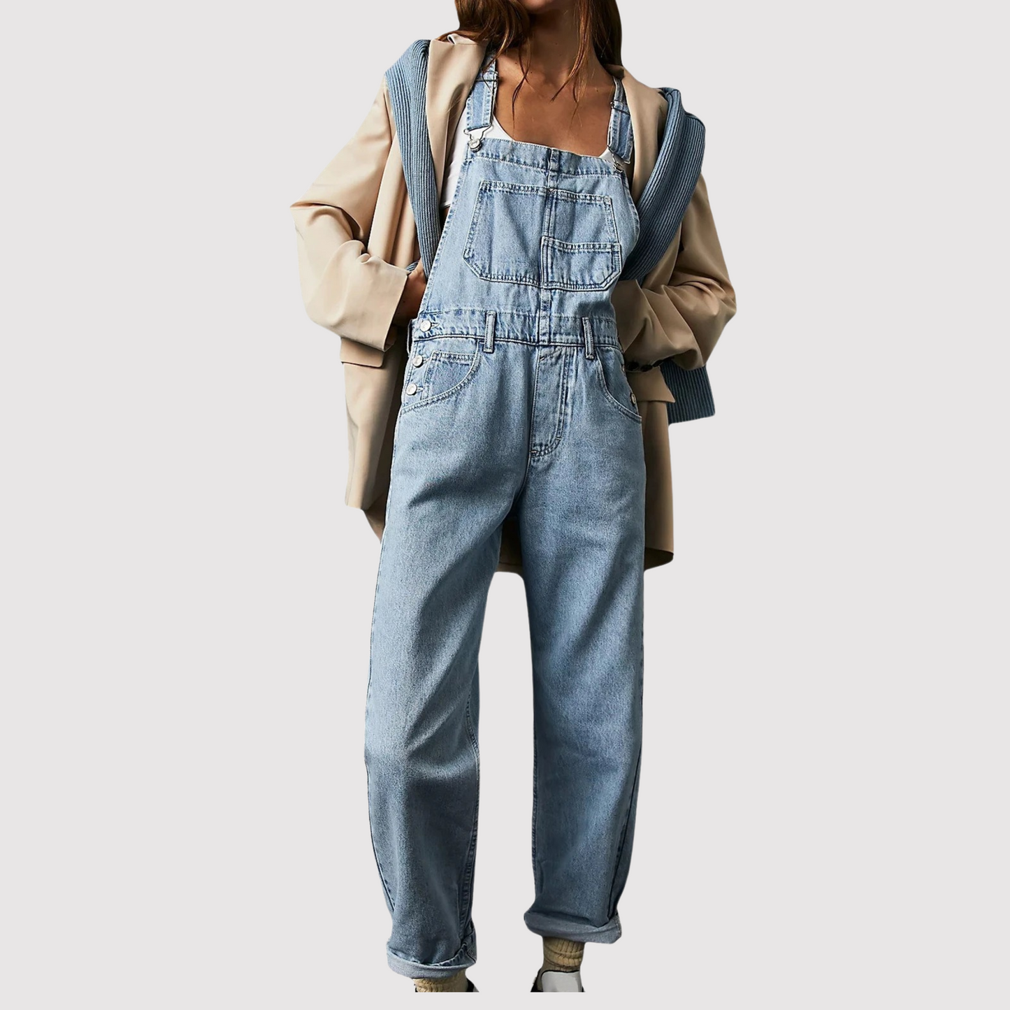 Women's relaxed fit denim jumpsuit with deep round neckline and oversized patch pockets