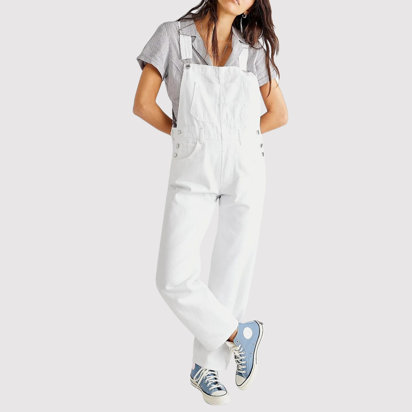 Women's relaxed fit denim jumpsuit with deep round neckline and oversized patch pockets