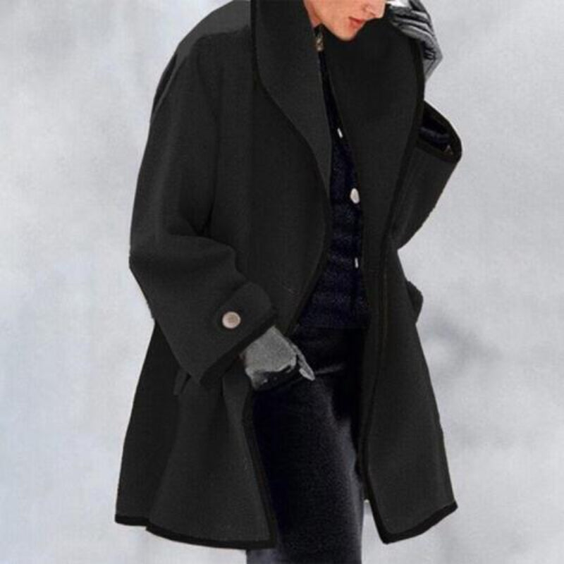 Beige oversized coat with wide lapel collar, contrast trim, and loose fit for winter elegance