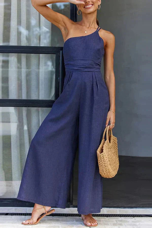 Women's black one-shoulder cotton jumpsuit with fitted waist and cropped wide-leg silhouette