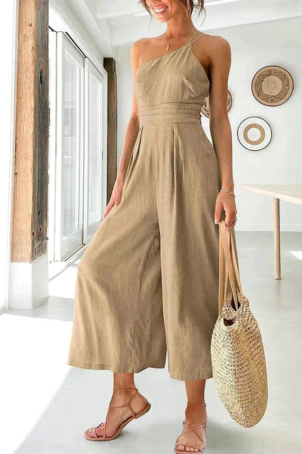 Women's black one-shoulder cotton jumpsuit with fitted waist and cropped wide-leg silhouette