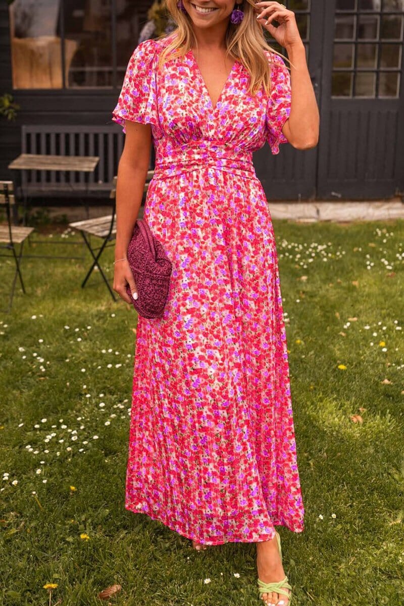 Floral maxi dress with deep V-neckline and flutter sleeves, lightweight feminine silhouette