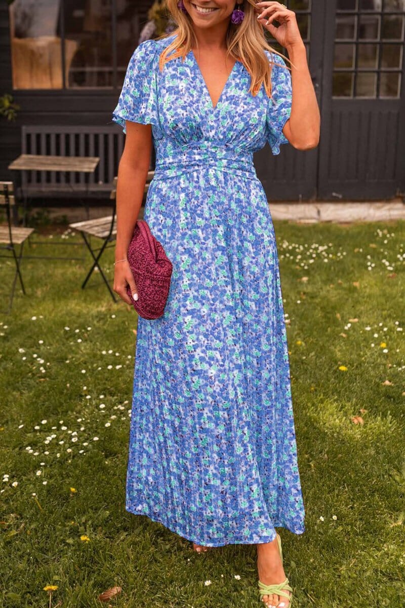 Floral maxi dress with V-neckline, micro floral print, soft drape, and full-length silhouette for warm-weather occasions