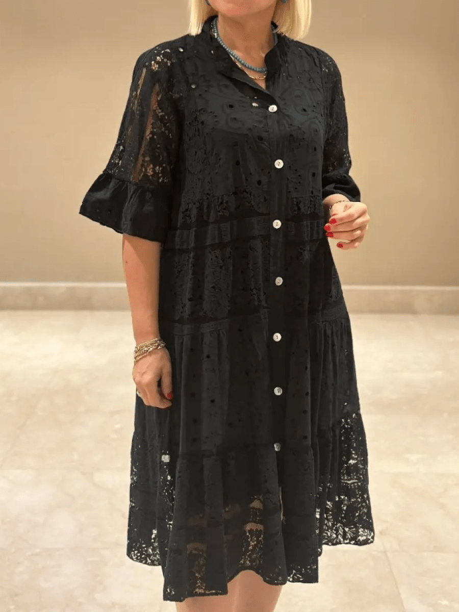 Floral midi dress with elegant embroidered details, light airy fabric, flattering silhouette for summer