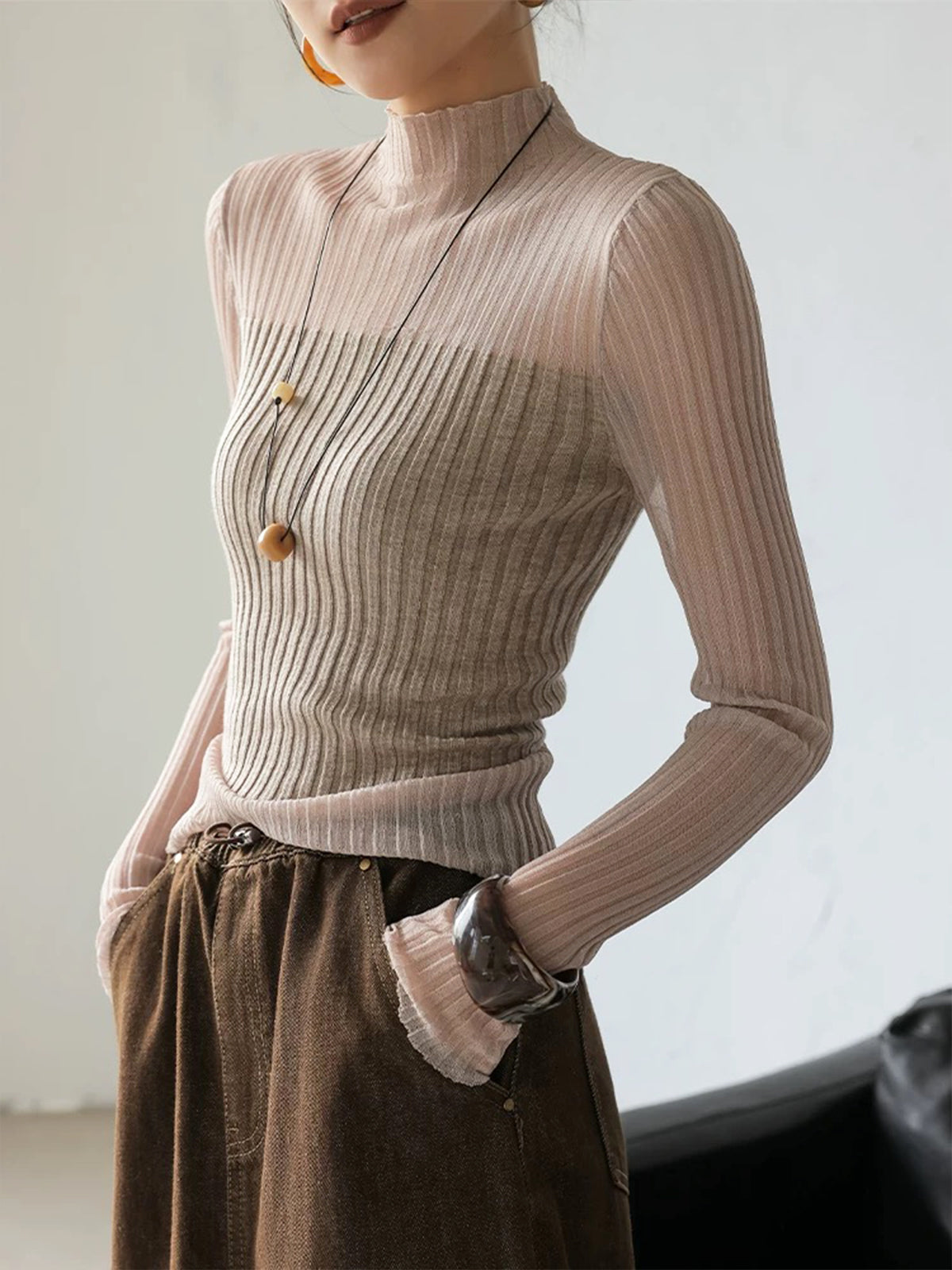 Slim-fit sheer panel rib-knit sweater with translucent mesh detail, casual versatile style