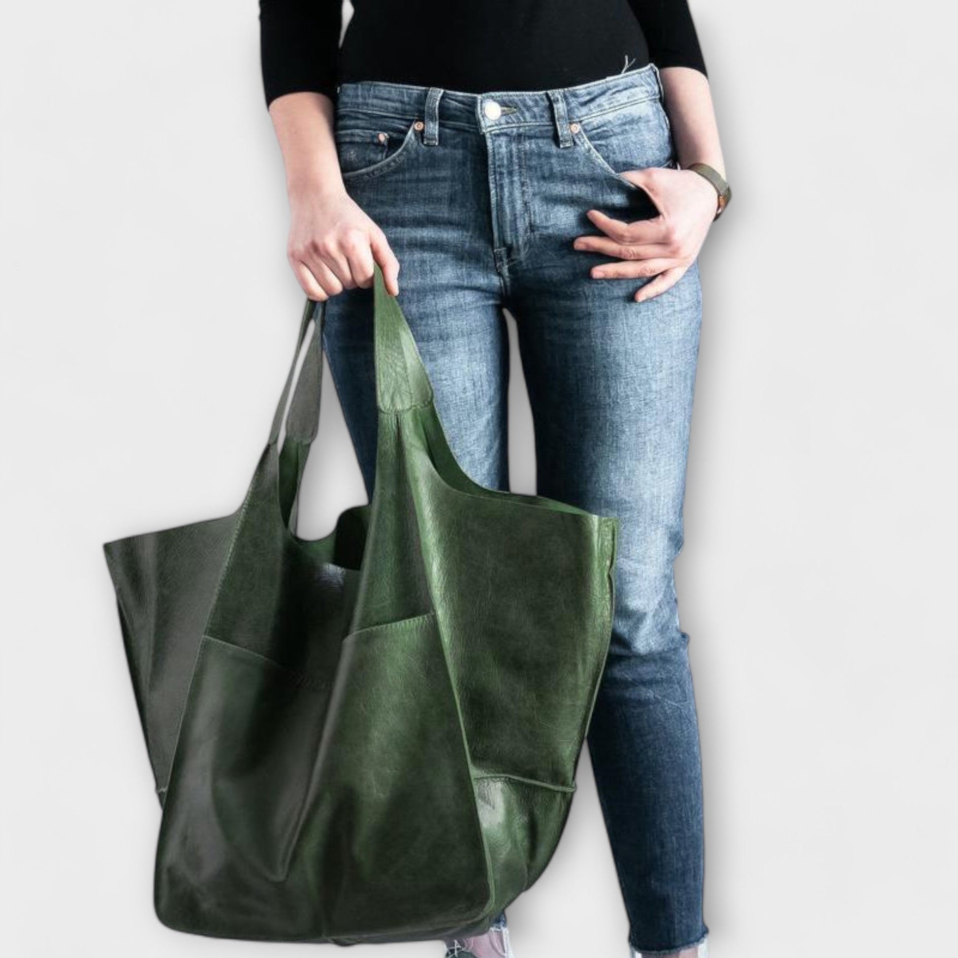 Beige minimalist tote bag with spacious interior and sleek structured silhouette for everyday use