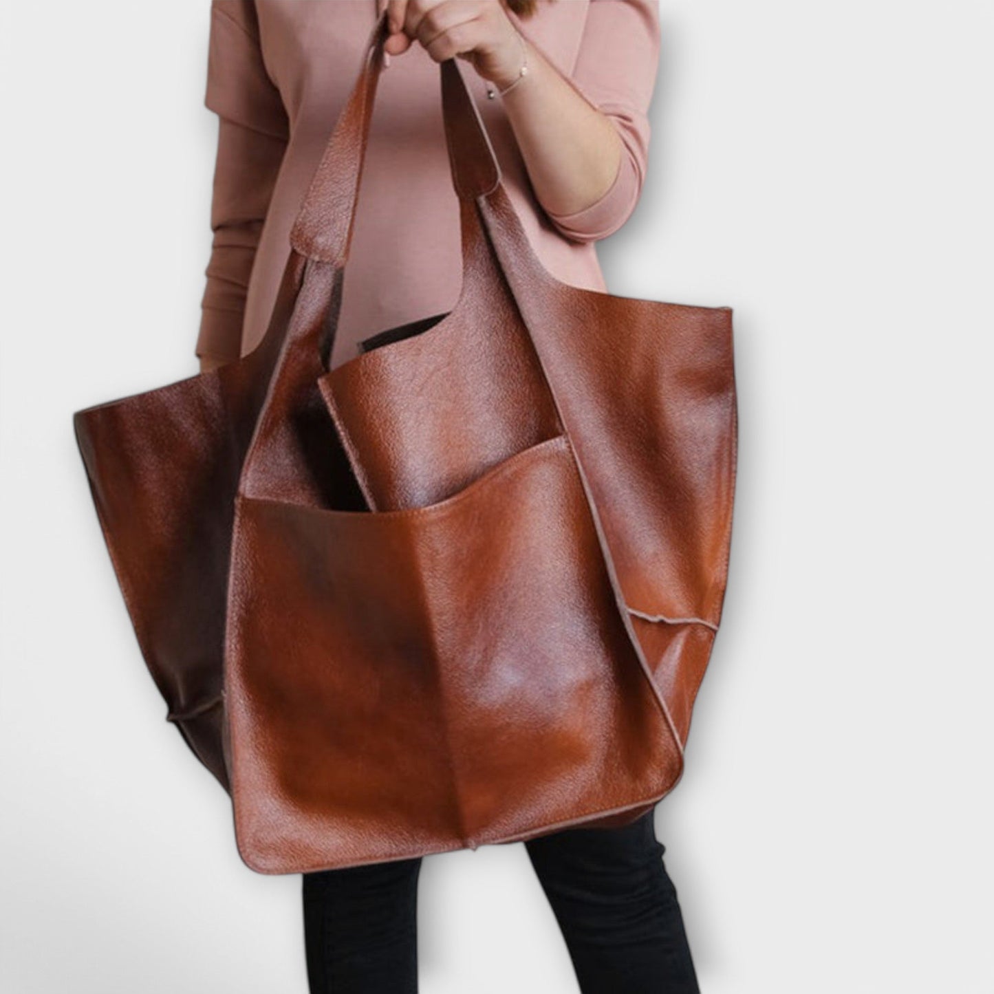 Beige minimalist spacious everyday tote bag with clean lines and structured silhouette for work or weekend