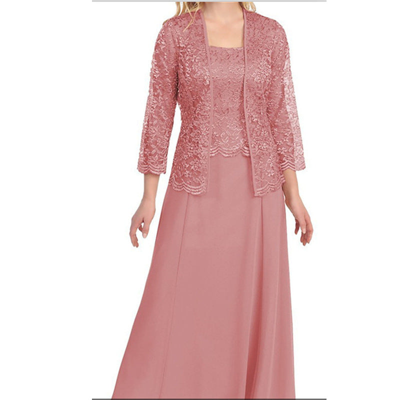 Women's black long-sleeve evening dress with flowing silhouette and sophisticated formal design