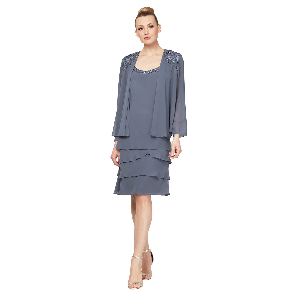 Knee-length chiffon tiered dress with beaded scoop neckline and matching long sleeve jacket in soft hues