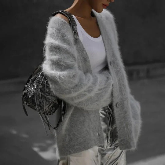 Soft plush knit cardigan in neutral tone, regular relaxed fit with lightweight drape for effortless layering