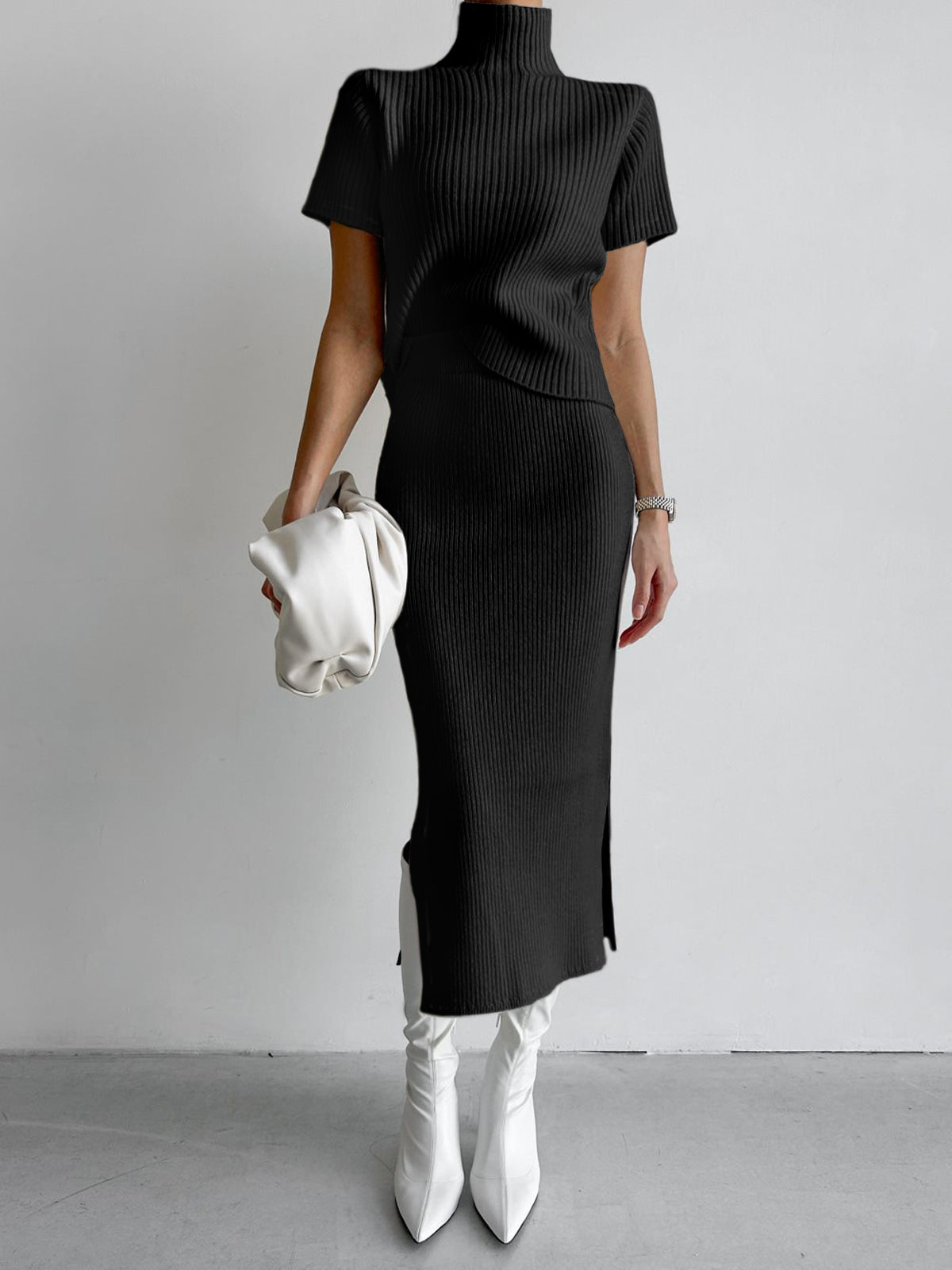 Solid ribbed knit two-piece skirt set with high neck, slim fit, and elegant split detail