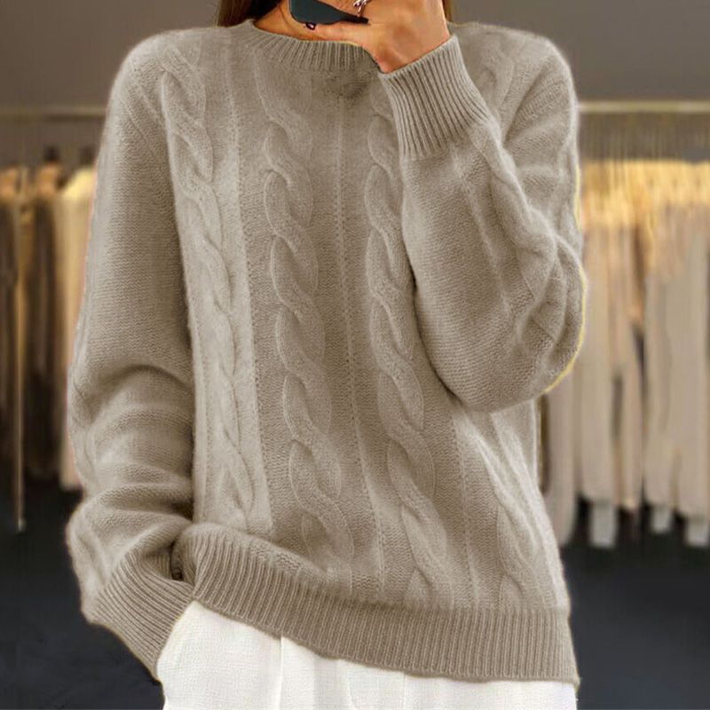 Women's cream cable knit wool blend pullover sweater, relaxed fit with ribbed hem detail