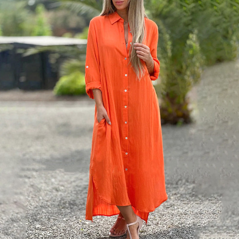 White casual button-down maxi shirt dress with tailored collar and flowing ankle-length silhouette