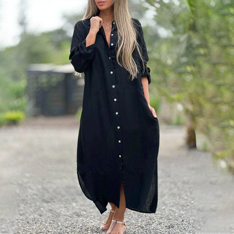 White casual button-down maxi shirt dress with tailored collar and flowing ankle-length silhouette