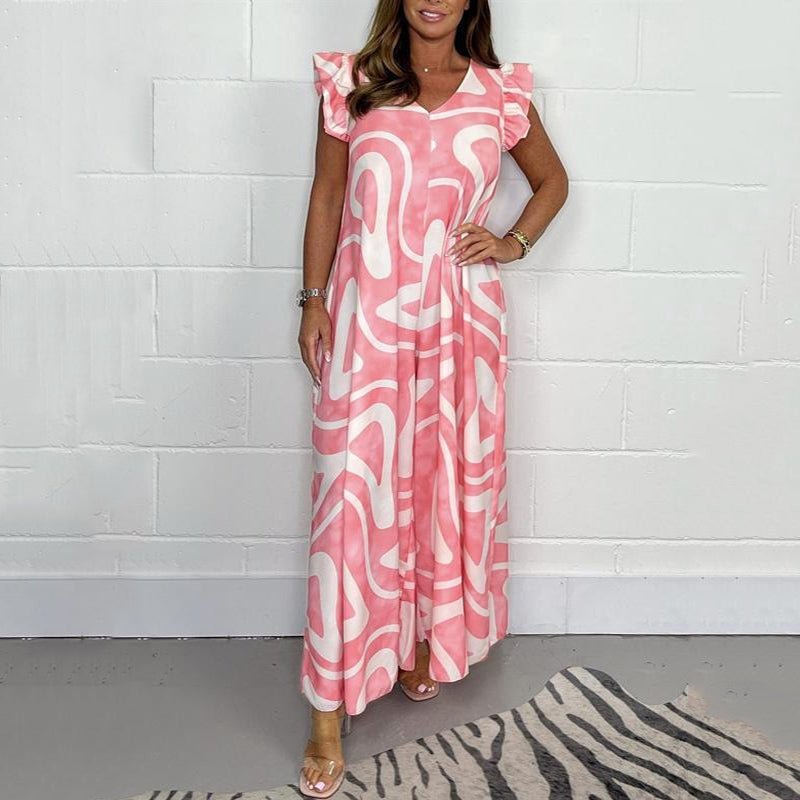 Women's black-white abstract print jumpsuit with V-neck, ruffle cap sleeves, and wide-leg silhouette