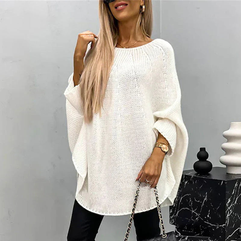 Women's chunky knit oversized sweater in soft yarn, thigh-length cozy casual fit with Nordic flair