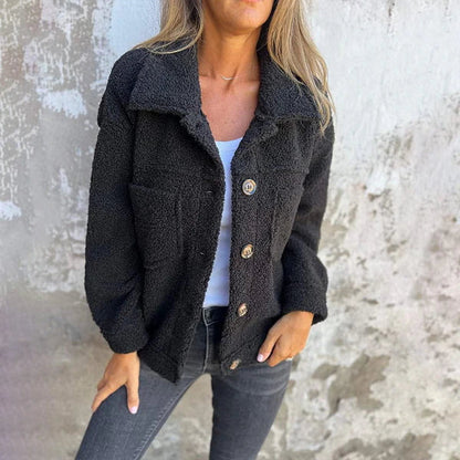 Women's brown short jacket with lapel collar, soft texture, cozy fit, bold autumn style