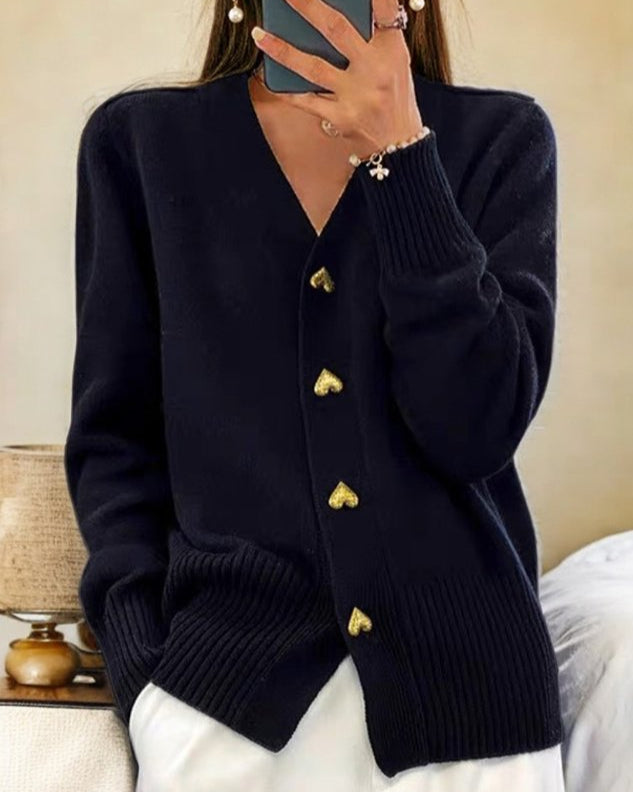 Soft elegant cardigan with heart-shaped buttons, flattering silhouette, perfect for layering everyday looks