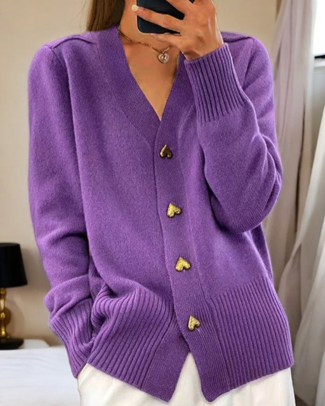 Soft elegant cardigan with delicate heart-shaped buttons, flattering silhouette, perfect for layering