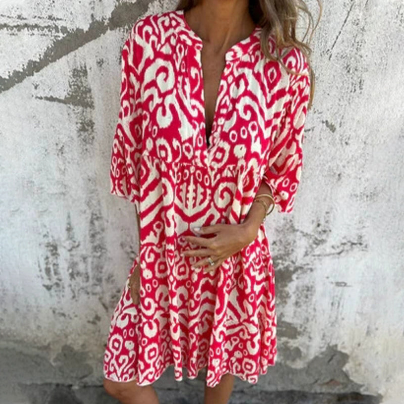 Women's printed draped elegant dress with chic patterned sleeves and flattering silhouette