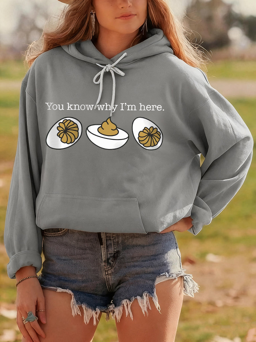 Unisex relaxed-fit hoodie with playful Turkey Day humor print, cozy soft interior for Thanksgiving gatherings