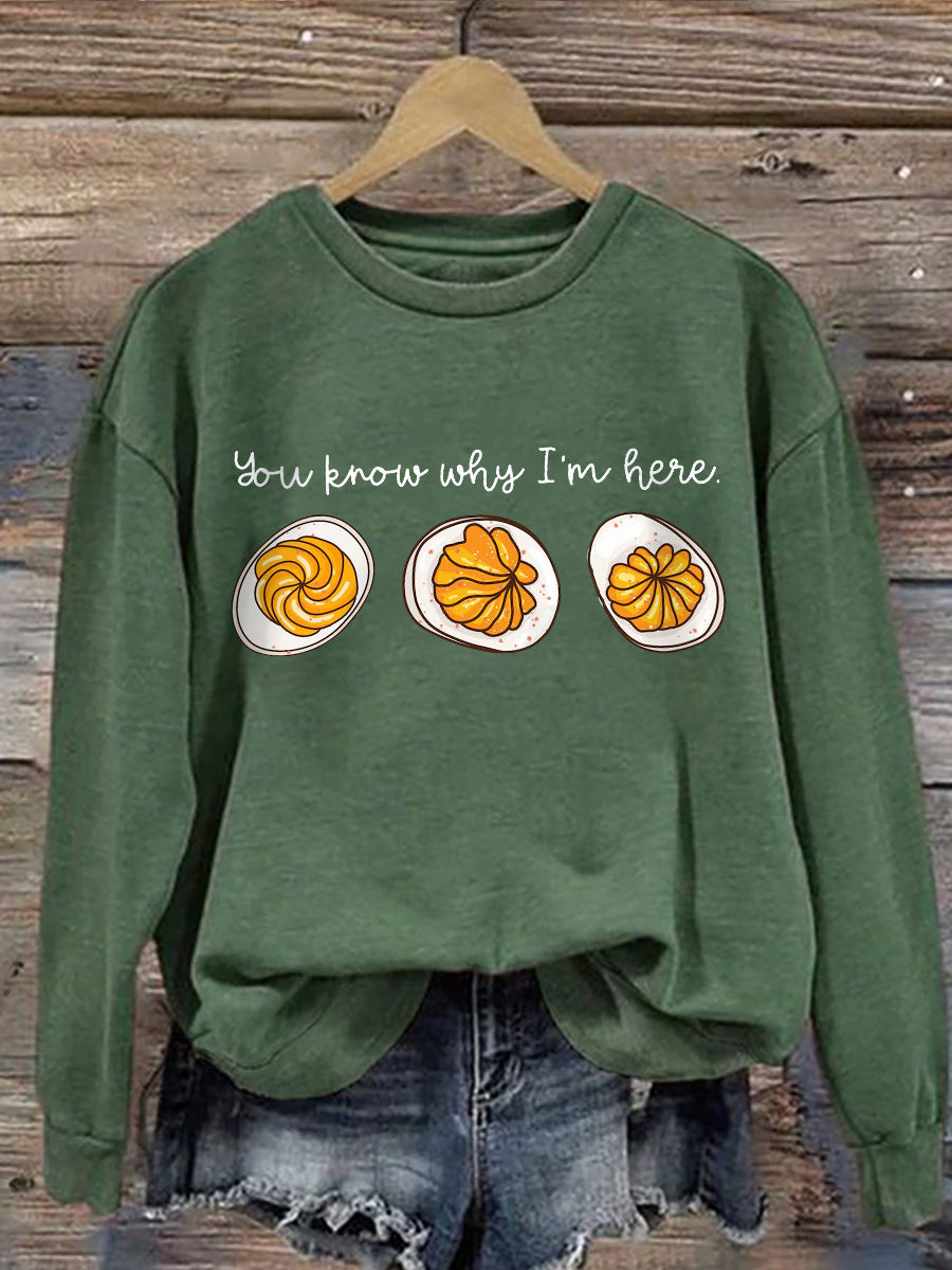 Gray relaxed-fit crewneck sweatshirt with bold "Feast Mode" festive graphic print