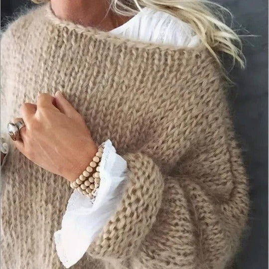 Stylish knitted sweater with relaxed flattering fit, cozy versatile design for everyday layering