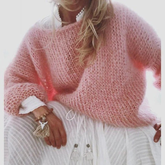 Relaxed-fit knitted sweater in neutral tone with clean silhouette, perfect for casual layering