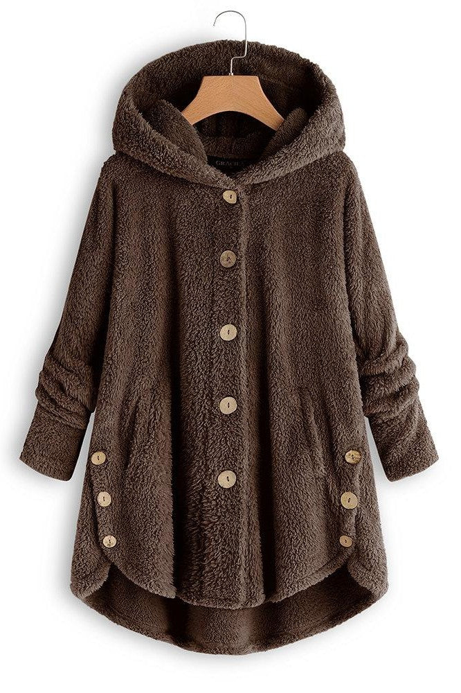 Women's oversized mid-length sherpa coat in neutral tone with hood and button front closure