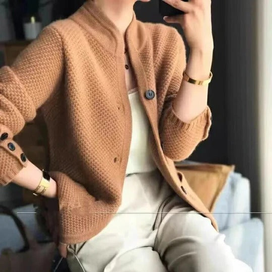 Soft gray unisex sweater jacket with structured fit and button-up closure for cold winter layering